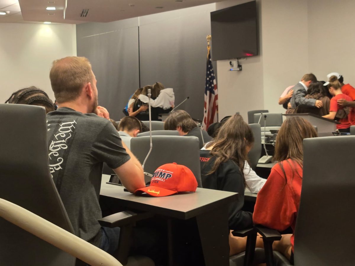 Attendees were invited to break off into groups and pray with one another.
