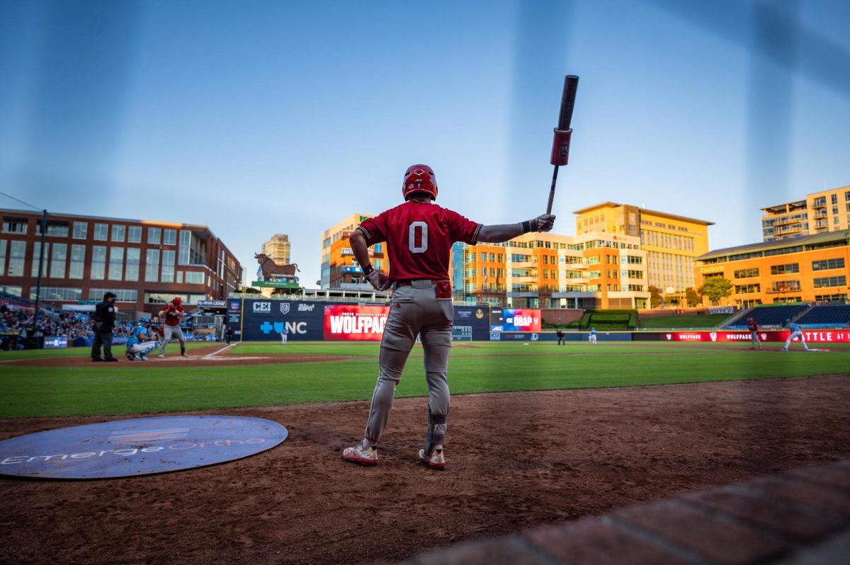 Junior infielder Luke Nixon waits in the on-deck circle during the exhibition against UNC at Durham Bulls Athletic Park on Thursday, Oct. 16, 2025. The Tar Heels defeated the Wolfpack 3-1.