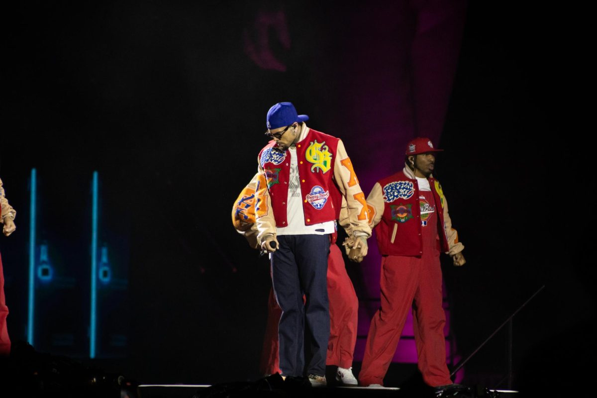 Chris Brown poses on stage in Carter-Finley Stadium on Tuesday, Oct. 14, 2025. Chris Brown holds the record for the most top 40 hits on the Billboard Hot 100 chart of any R&B singer in history.
