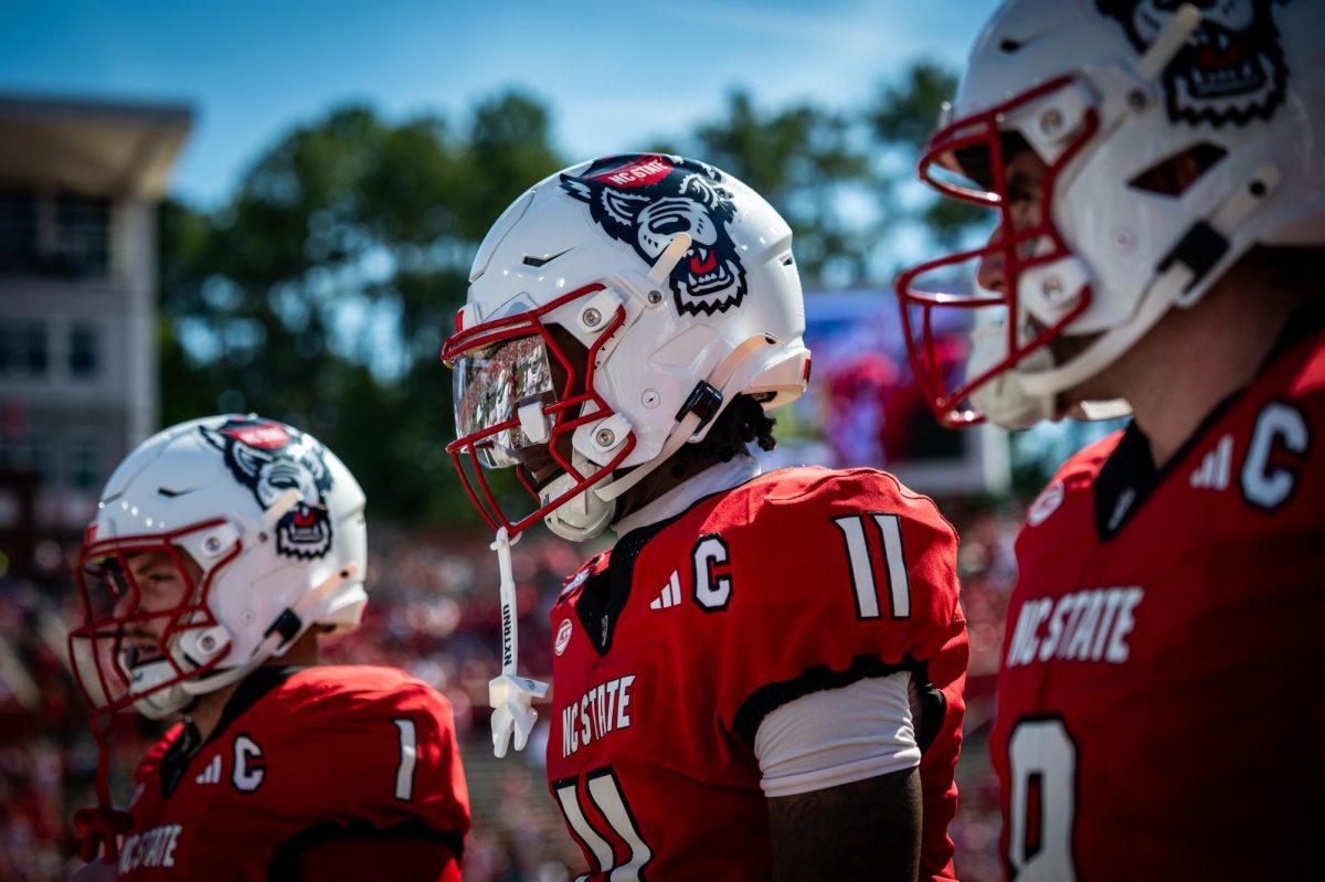 NC State's captains wait on the field for the coin toss before the game against Campbell in Carter-Finley Stadium on Saturday, Oct. 4, 2025. The Wolfpack beat the Camels 56-10.