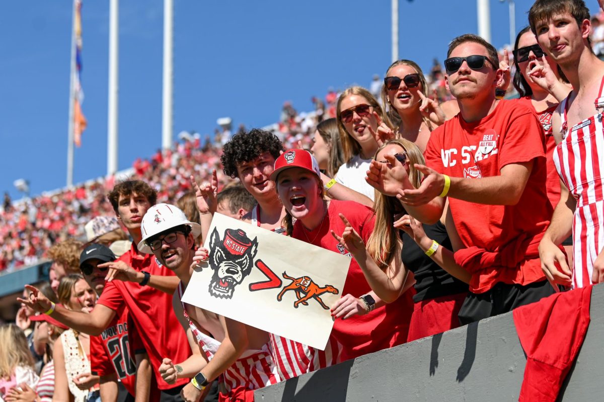 Fans display a sign and cheer during the game against Campbell on Saturday, Oct. 4, 2025 at Carter-Finley Stadium. NC State beat Campbell 10-56.