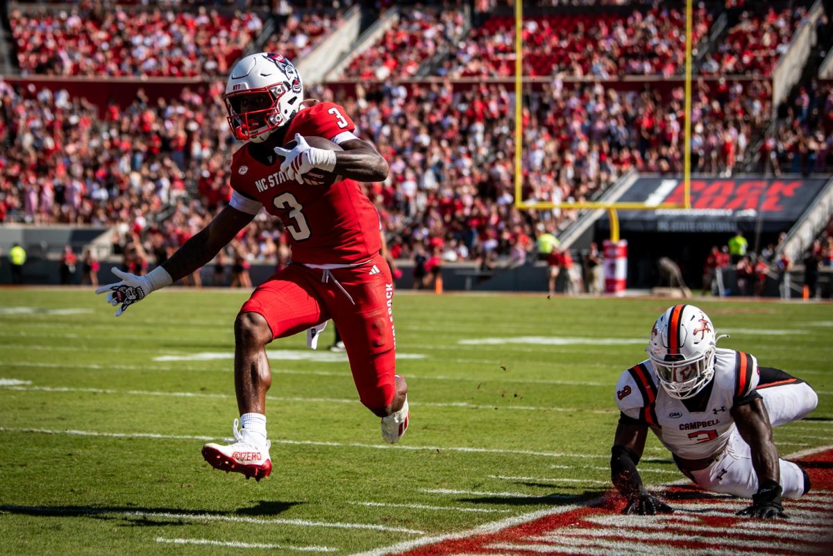 Redshirt sophomore running back Hollywood Smothers runs for the endzone during the game against Campbell in Carter-Finley Stadium on Saturday, Oct. 4, 2025. Smothers rushed for 123 yards and recorded two total touchdowns. The Wolfpack beat the Camels 56-10.