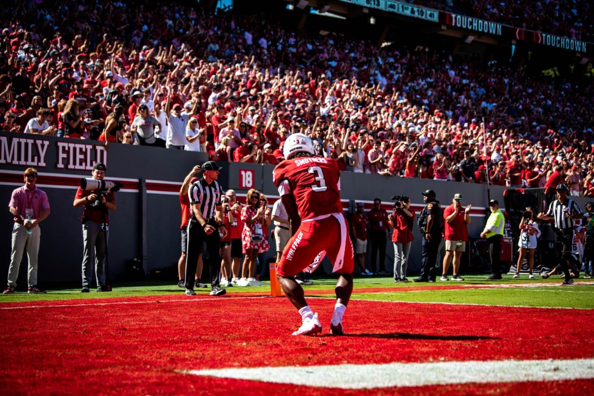 Redshirt sophomore running back Hollywood Smothers celebrates a touchdown during the game against Campbell in Carter-Finley Stadium on Saturday, Oct. 4, 2025. Smothers rushed for 123 yards. The Wolfpack beat the Camels 56-10.