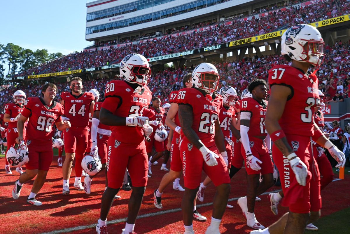 NC State walks back to the locker rooms during halftime at the game against Campbell on Saturday, Oct. 4, 2025 at Carter-Finley Stadium. NC State totaled 236 yards in rushing. NC State beat Campbell 10-56.