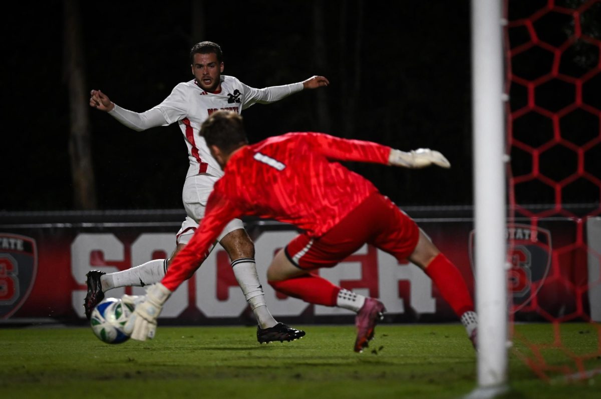Senior midfielder Drew Lovelace shoots the ball during the game versus Virginia at Dail Soccer Stadium on Sunday, Oct. 5, 2025. Virginia beat NC State 1-0.
