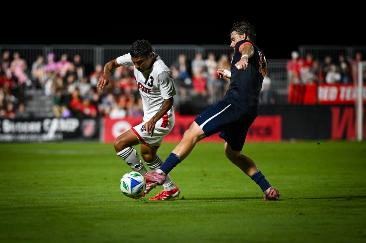 Senior defender Calem Tommy possesses the ball during the game versus Virginia at Dail Soccer Stadium on Sunday, Oct. 5, 2025. Virginia beat NC State 1-0.