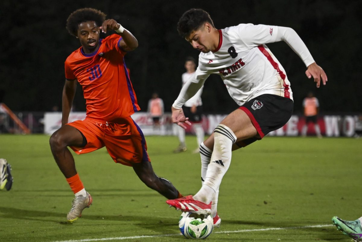 Senior midfielder Justin McLean dribbles the ball during the game against Clemson at Dail Soccer Stadium on Friday, Oct. 10, 2025. McLean started 12 games during his previous season at Georgia State. The Wolfpack defeated the Tigers 1-0.