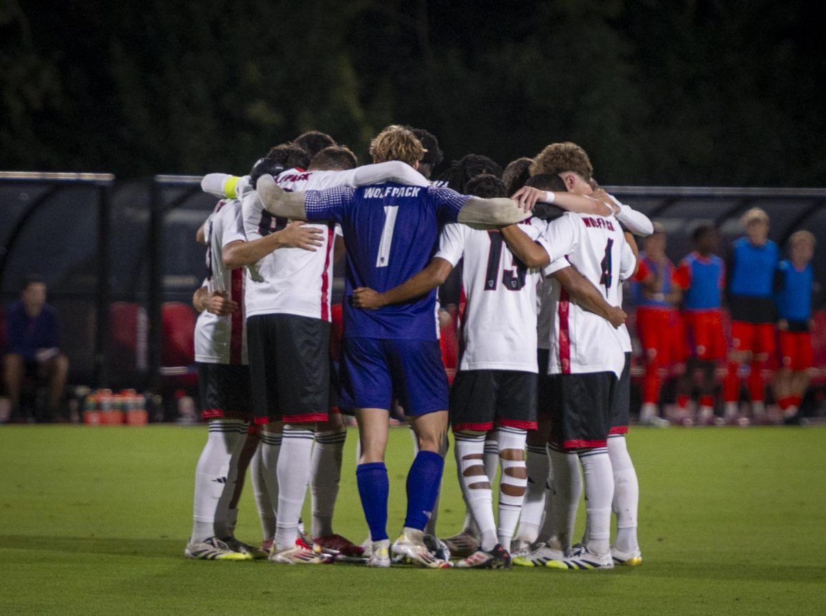 NC State players huddle up on the field before the game against Clemson in Dail Soccer Stadium on Friday, Oct. 10, 2025. The Wolfpack defeated the Tigers 1-0. 