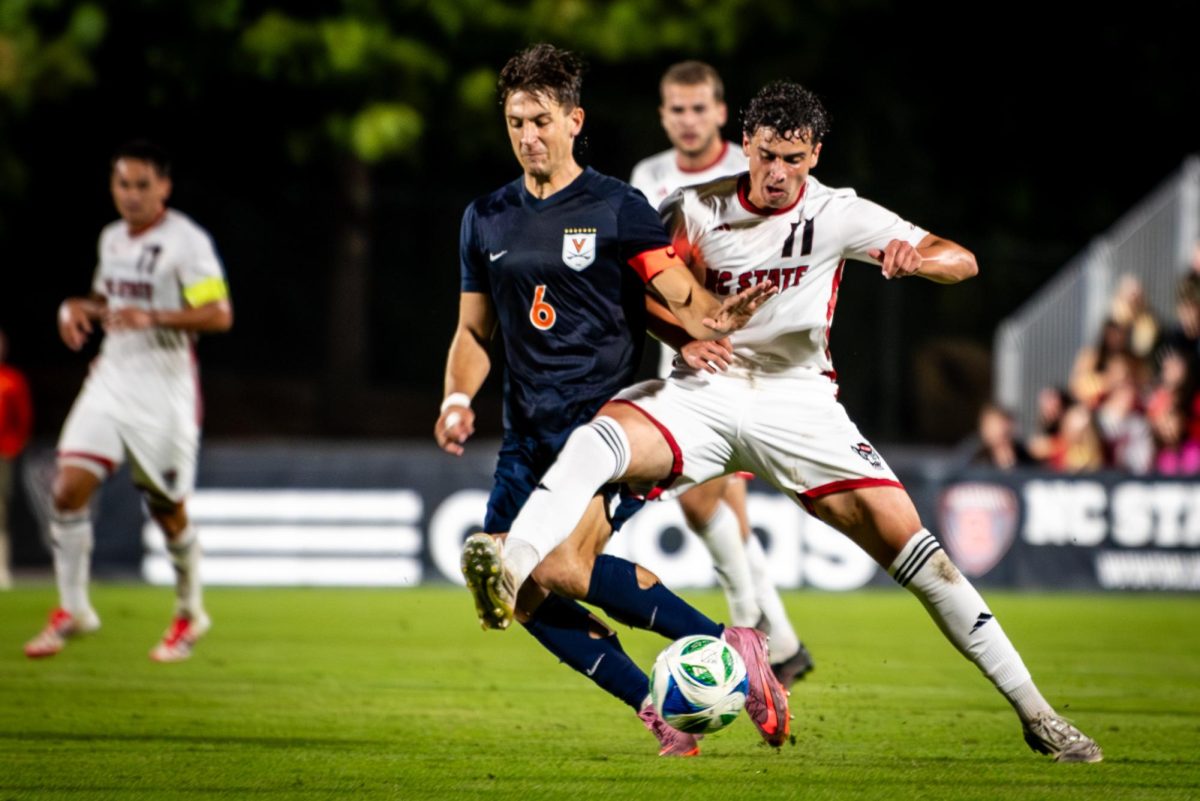 Sophomore forward Frankie DeFrancesco fights for possession during the game against Virginia in Dail Soccer Stadium on Sunday, Oct. 5, 2025. The Cavaliers defeated the Wolfpack 1-0.