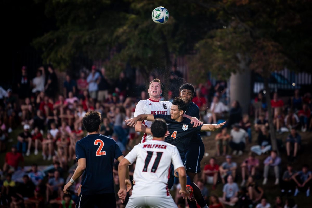 Sophomore defenseman Nikola Markovic rises for a header during the game against Virginia in Dail Soccer Stadium on Sunday, Oct. 5, 2025. The Cavaliers defeated the Wolfpack 1-0.