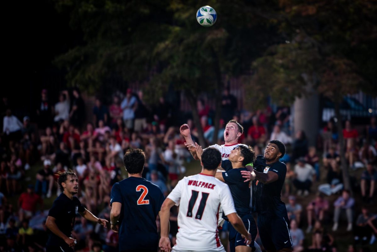 Sophomore defenseman Nikola Markovic rises for a header during the game against Virginia in Dail Soccer Stadium on Sunday, Oct. 5, 2025. The Cavaliers defeated the Wolfpack 1-0.