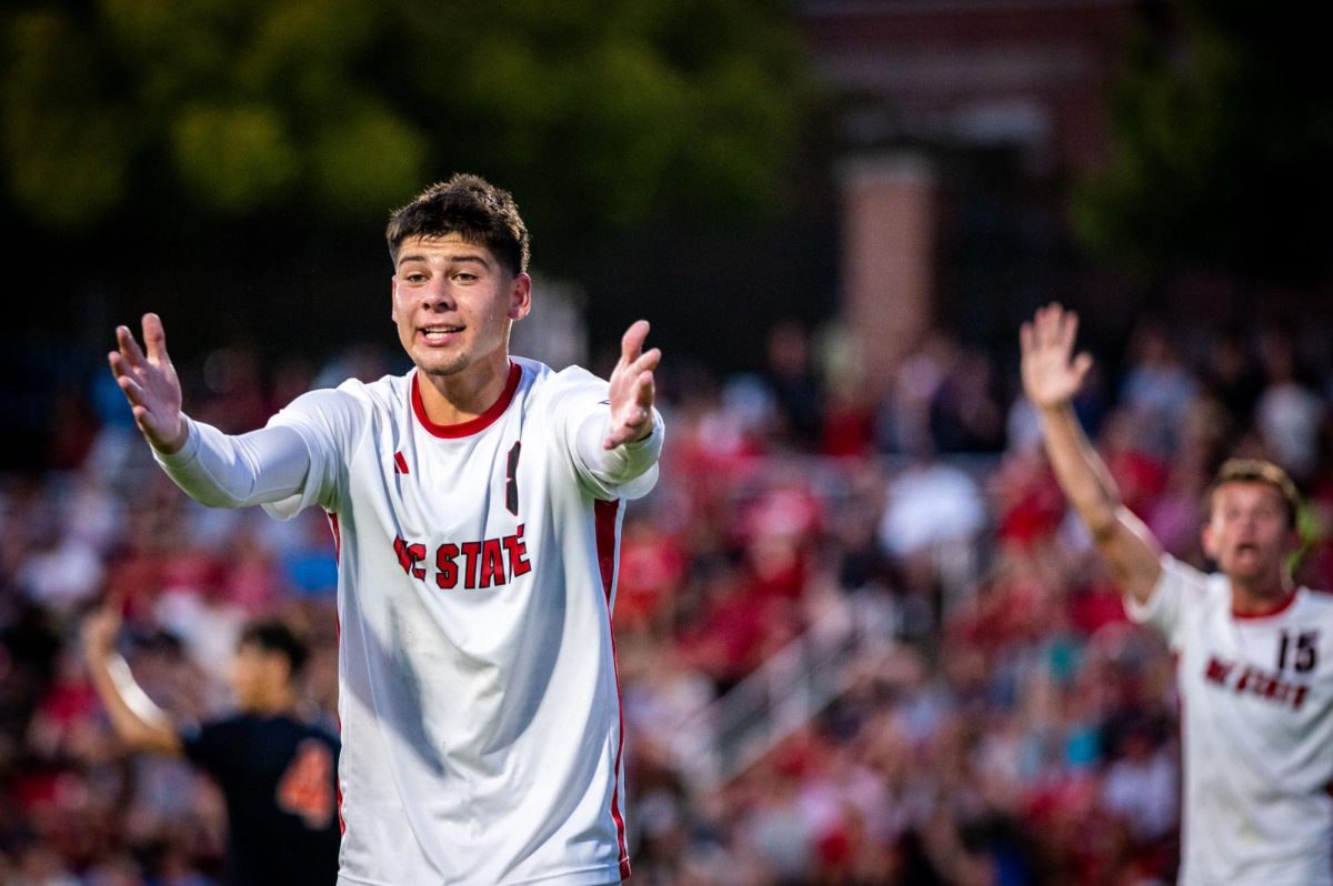 Senior midfielder Justin McLean asks the referee for a corner kick during the game against Virginia in Dail Soccer Stadium on Sunday, Oct. 5, 2025. The Cavaliers defeated the Wolfpack 1-0.