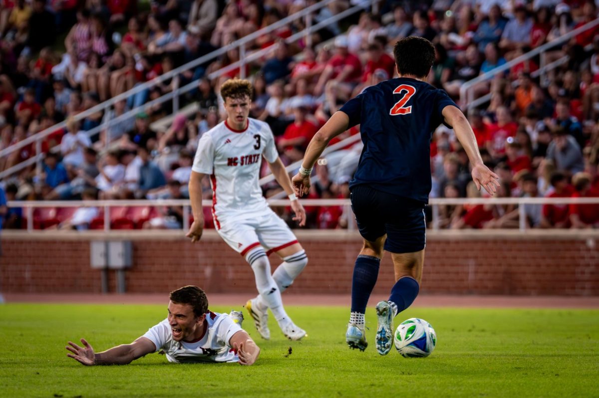 Redshirt junior forward Aidan Payne yells for a foul during the game against Virginia in Dail Soccer Stadium on Sunday, Oct. 5, 2025. The Cavaliers defeated the Wolfpack 1-0.