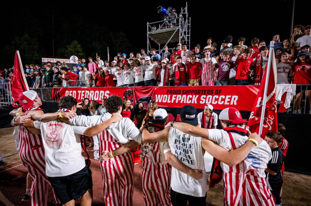 Leaders of the Red Terrors student section start a chant during the game against Virginia in Dail Soccer Stadium on Sunday, Oct. 5, 2025. The Cavaliers defeated the Wolfpack 1-0.