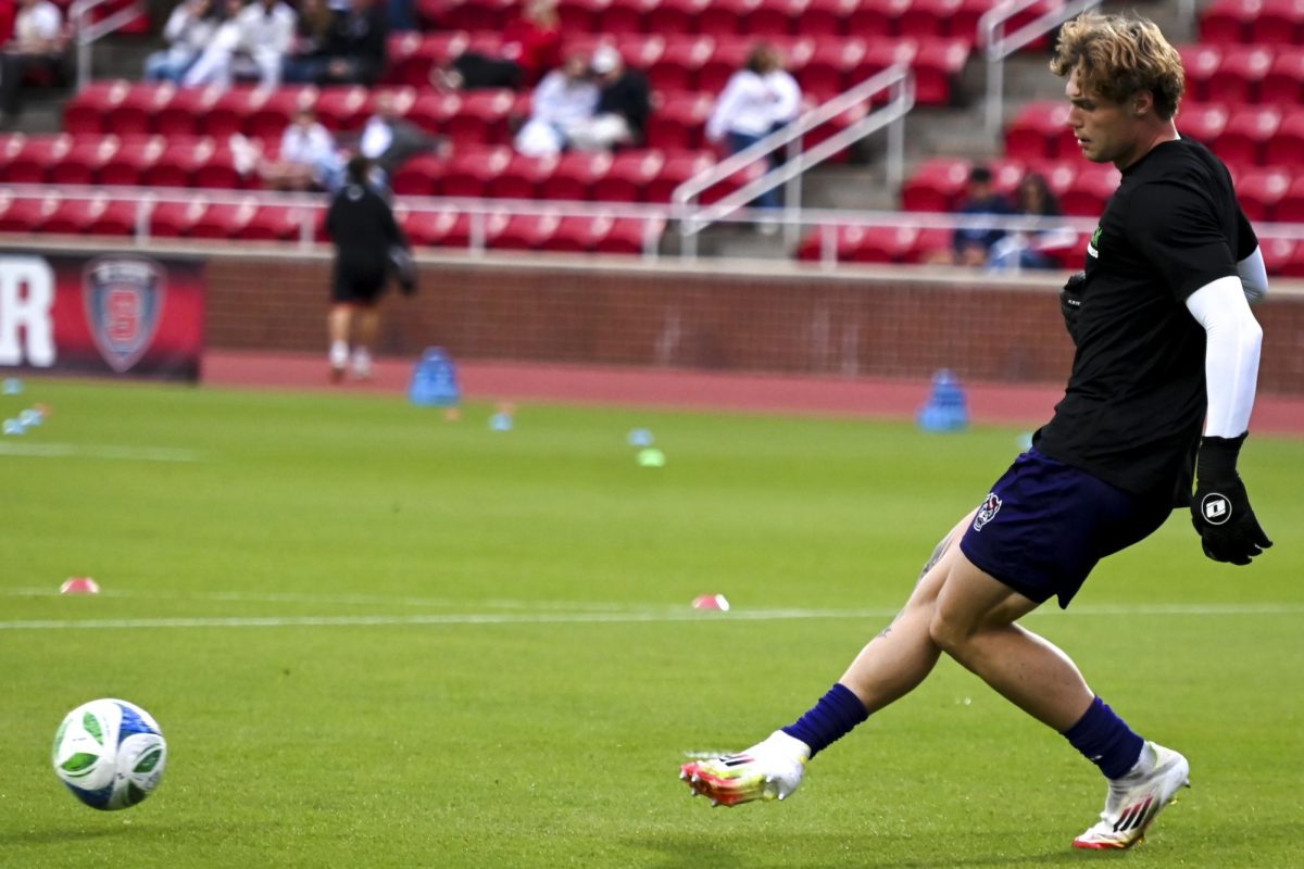 Senior goal keeper Logan Erb passes before the game against Clemson at Dial Soccer Stadium on Friday, Oct. 10, 2025. Erb has started 12 during the 2025 season. The Wolfpack defeated the Tigers 1-0.