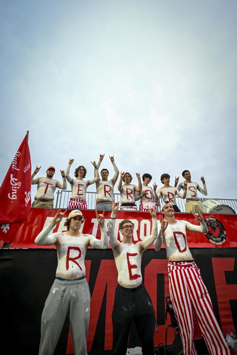 Red Terrors cheer before the game against Clemson at Dail Soccer Stadium on Friday, Oct. 10, 2025. The Red Terrors was founded by Ramakrishna Aravind in 2018. The Wolfpack defeated the Tigers 1-0.