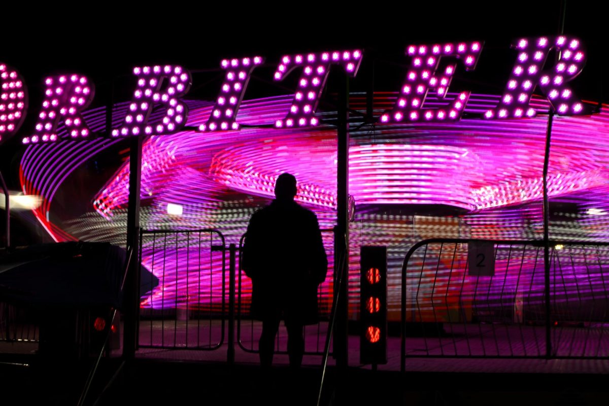 The Orbiter spins vistors around during the North Carolina State Fair on Oct. 22, 2025. Fairgoers take part in fair food, rides, and art exhibitions. 