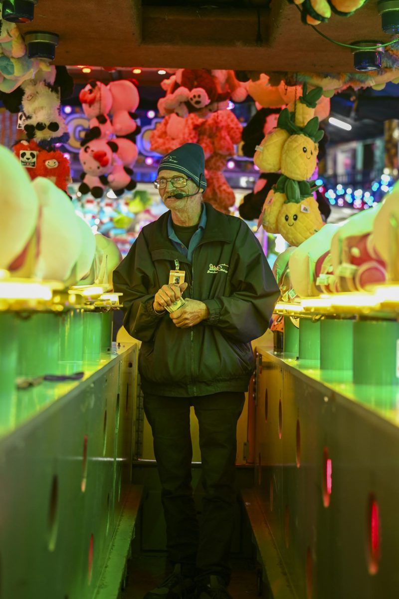 Doc from Florida is caught working at the North Carolina State Fair in Raleigh on Wednesday, Oct. 22, 2025. "I've been hootin' and hollerin' all day," said Doc.