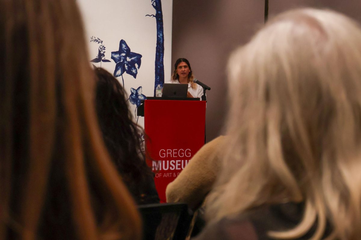 Claire Alexandre, speaks to the crowd of attendees during her artist talk at the Gregg Museum of Art & Design on Thursday, Oct. 16, 2025. Alexandre spoke about her relationship with her father, the earth and other artistic mediums.