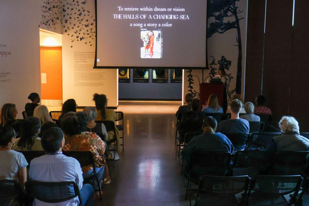 Claire Alexandre, speaks to the crowd of attendees during her artist talk at the Gregg Museum of Art & Design on Thursday, Oct. 16, 2025. Alexandre's exhibit is on display until February. 