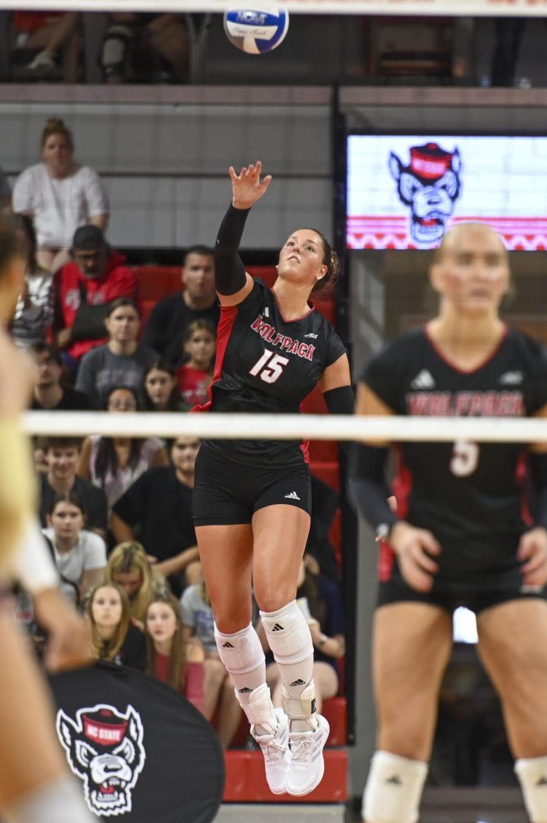 Senior middle blocker Lily Cropper serves the ball during the game against Florida State at Reynolds Coliseum on Sunday, Oct. 5, 2025. Cropper got two kills. NC State beat Florida State 3-2.