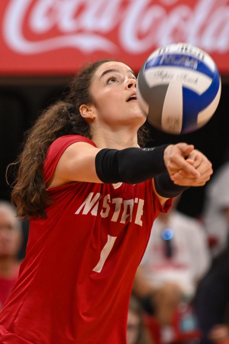 Freshman libero Zuzia Maciejewicz receives the oncoming spike during the game against Florida State at Reynolds Coliseum on Sunday, Oct. 5, 2025. Maciejewicz had four serve assists. NC State beat Florida State 3-2.