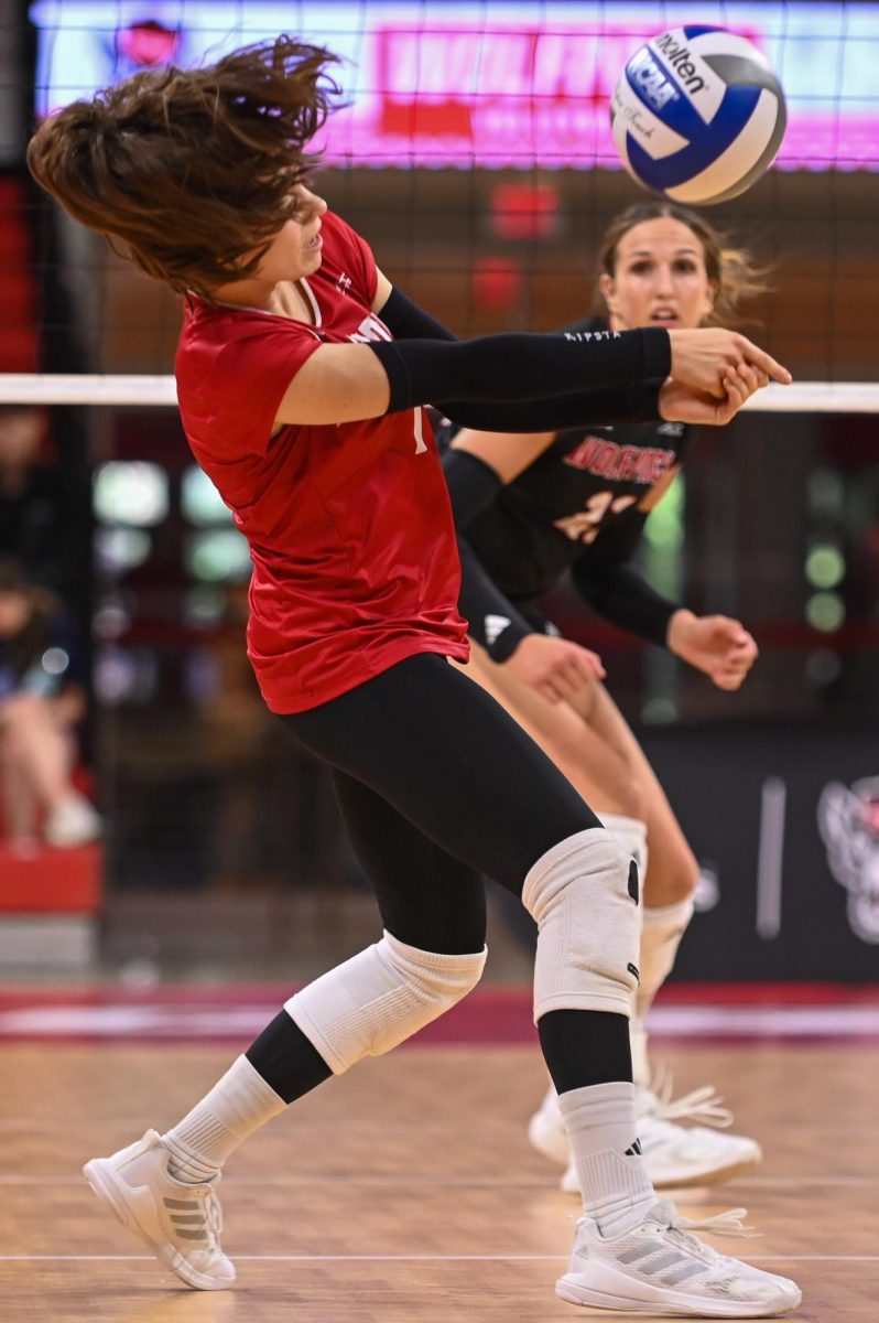 Freshman libero Zuzia Maciejewicz receives the oncoming spike during the game against Florida State at Reynolds Coliseum on Sunday, Oct. 5, 2025. Maciejewicz had four serve assists. NC State beat Florida State 3-2.