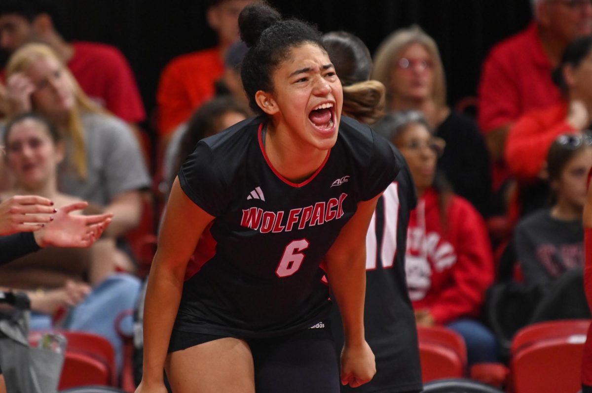 Freshman middle blocker Hailey McFadden celebrates a point during the game against Florida State at Reynolds Coliseum on Sunday, Oct. 5, 2025. NC State beat Florida State 3-2.