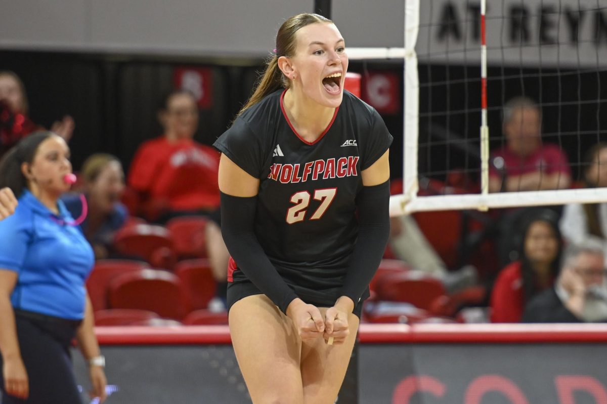 Freshman outside hitter Rebecca Ring celebrates after scoring a point during the game against Florida State at Reynolds Coliseum on Sunday, Oct. 5, 2025. Ring got 18 kills. NC State beat Florida State 3-2.