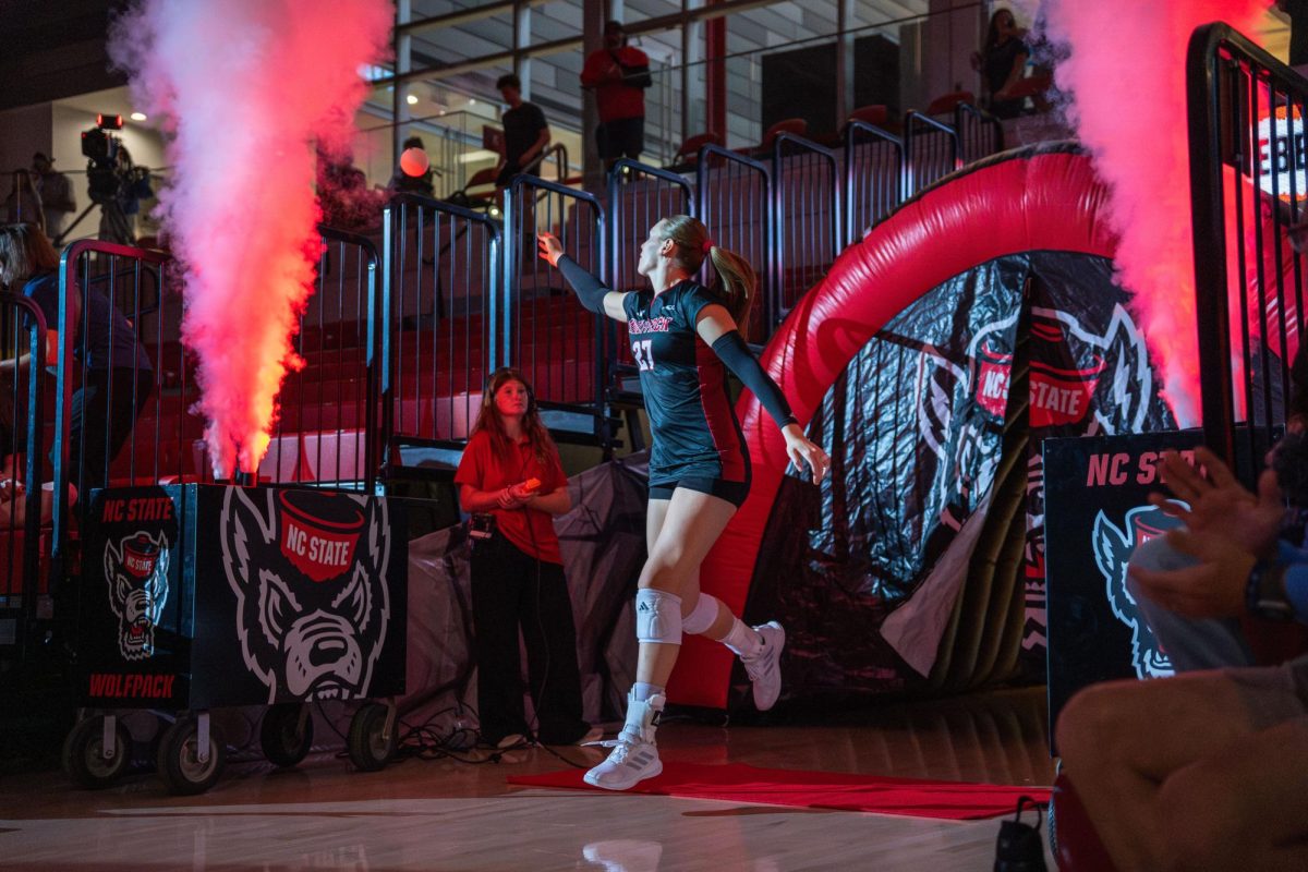 Freshman outside hitter Rebecca Ring enters the stadium tossing a ball before the game against Florida State at Reynolds Coliseum on Sunday, Oct. 5, 2025. Ring made 18 kills. NC State beat Florida State 3-2.