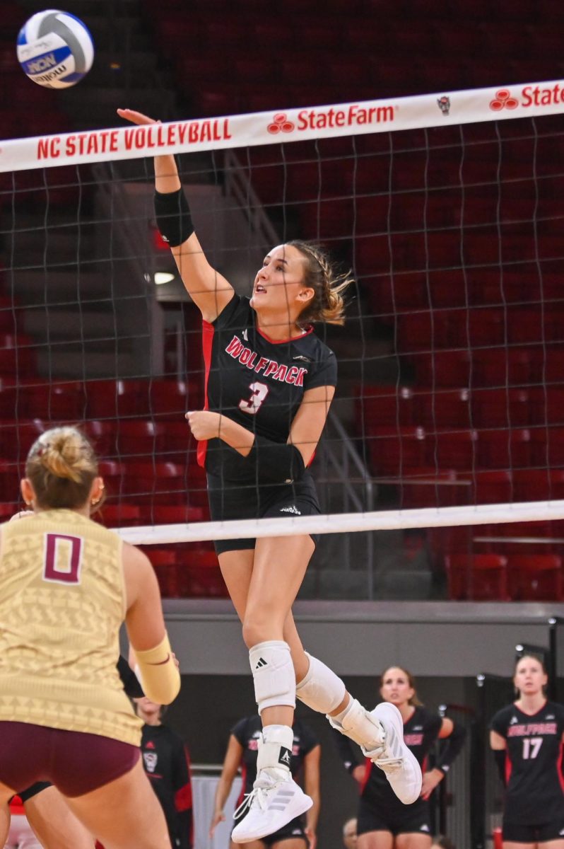 Junior outside hitter Clara Vondran spikes the ball during the game against Florida State at Reynolds Coliseum on Sunday, Oct. 5, 2025. Vondran had four kills. NC State beat Florida State 3-2.