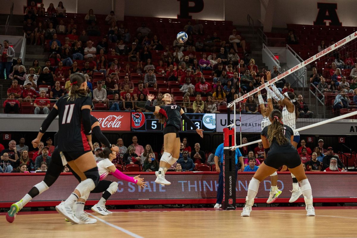 Freshman outside hitter Rebecca Ring jumps to spike the ball during the game against Georgia Tech in Reynolds Coliseum on Sunday, Oct. 19, 2025. Ring made 8 kills. NC State lost to Georgia Tech 0-3.