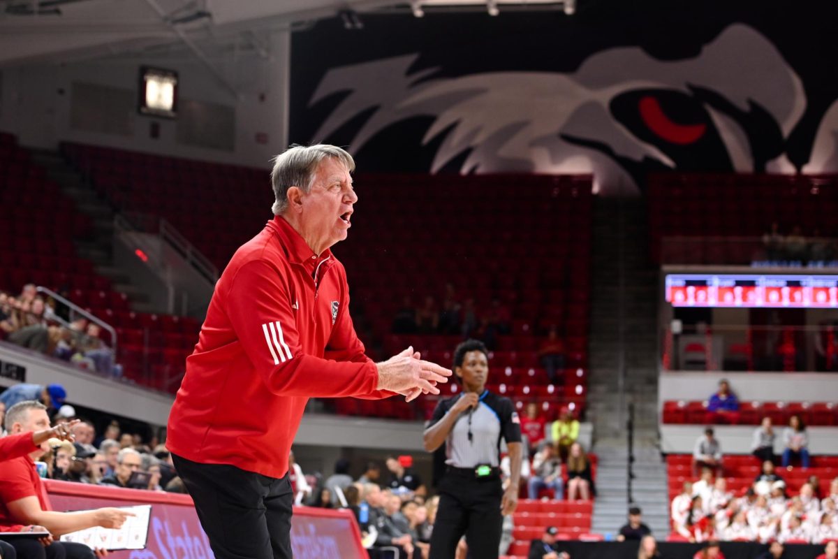 Head coach Wes Moore communicates with his players during the exhibition against High Point on Saturday, Oct. 18, 2025. The Wolfpack beat the Panthers 77-69.