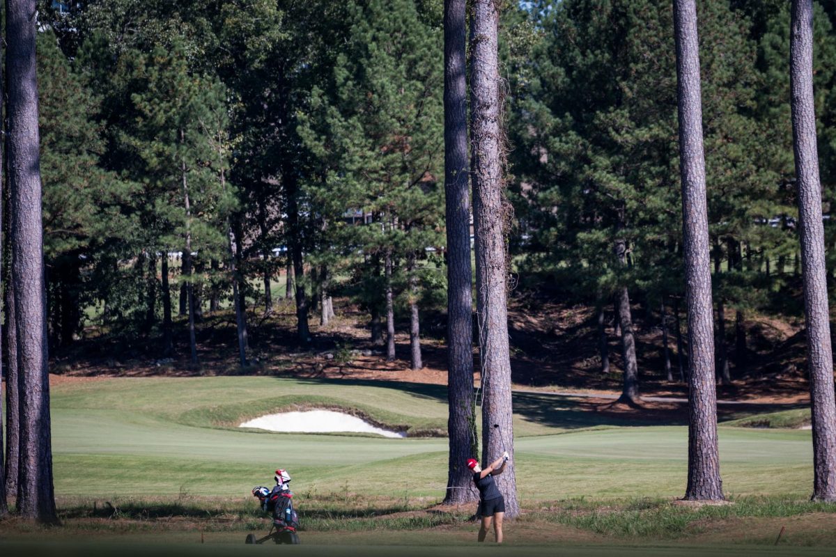Freshman golfer Lindsay McGrath follows through on her shot at round 2 of the Ruth's Chris Tar Heel Invitational at the UNC Finley Golf Course on Saturday, Oct. 18, 2025. NC State finished in third place at the Invitational.