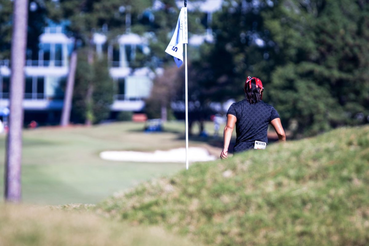 Senior Golfer Vania Simont walking at round 2 of the Ruth's Chris Tar Heel Invitational at the UNC Finley Golf Course on Saturday, Oct. 18, 2025. NC State finished in third place at the Invitational.