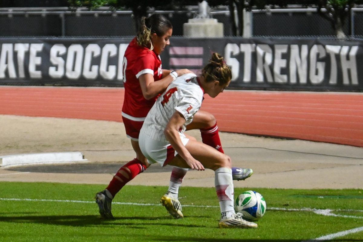 Sophomore forward Antonella Mazziotto fights for the ball during the game against Louisville at Dail Soccer Stadium on Thursday, Oct. 23, 2025. The Cardinals defeated the Wolfpack 3-0. 