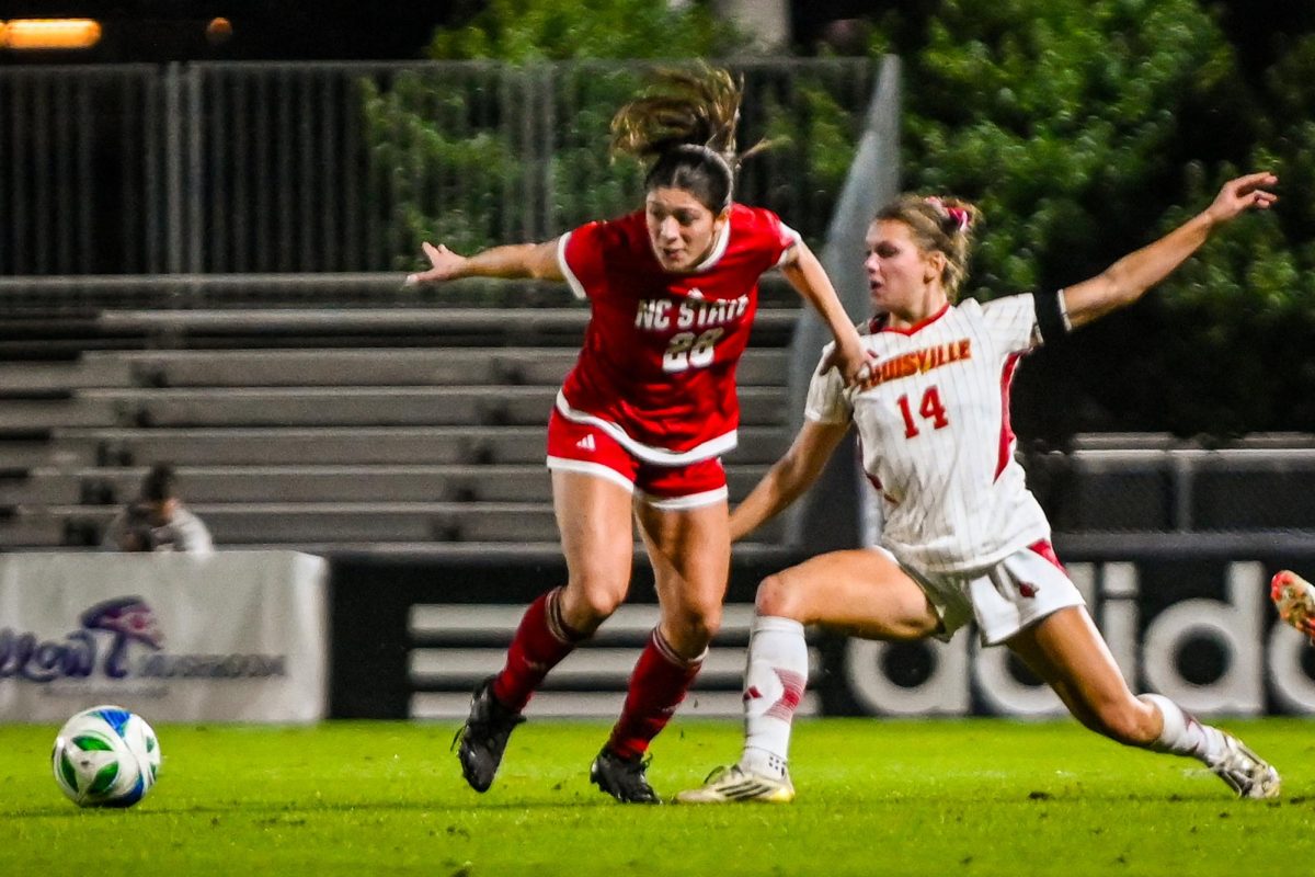 Junior forward Sophia Hernandez goes for the ball during the game against Louisville at Dail Soccer Stadium on Thursday, Oct. 23, 2025. The Cardinals defeated the Wolfpack 3-0. 