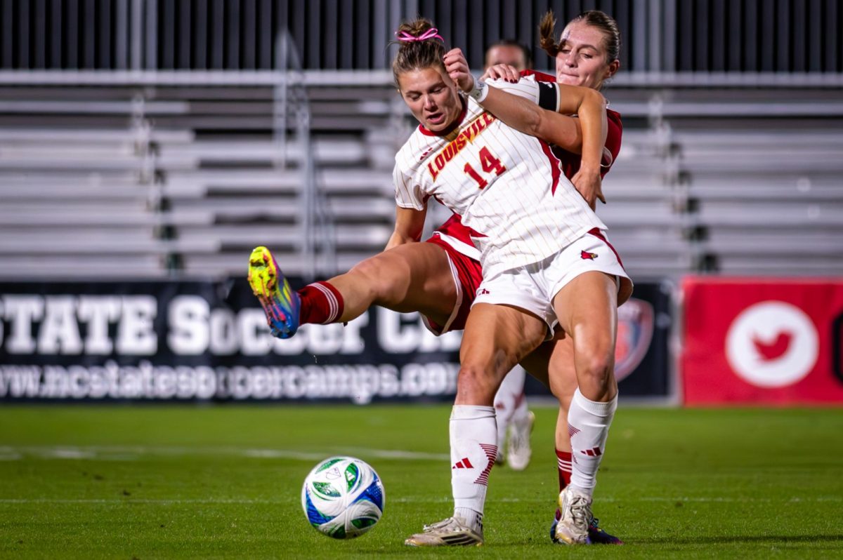 Junior forward Jade Bordeleau fights for the ball during the game against Louisville at Dail Soccer Stadium on Thursday, Oct. 23, 2025. The Cardinals defeated the Wolfpack 3-0.