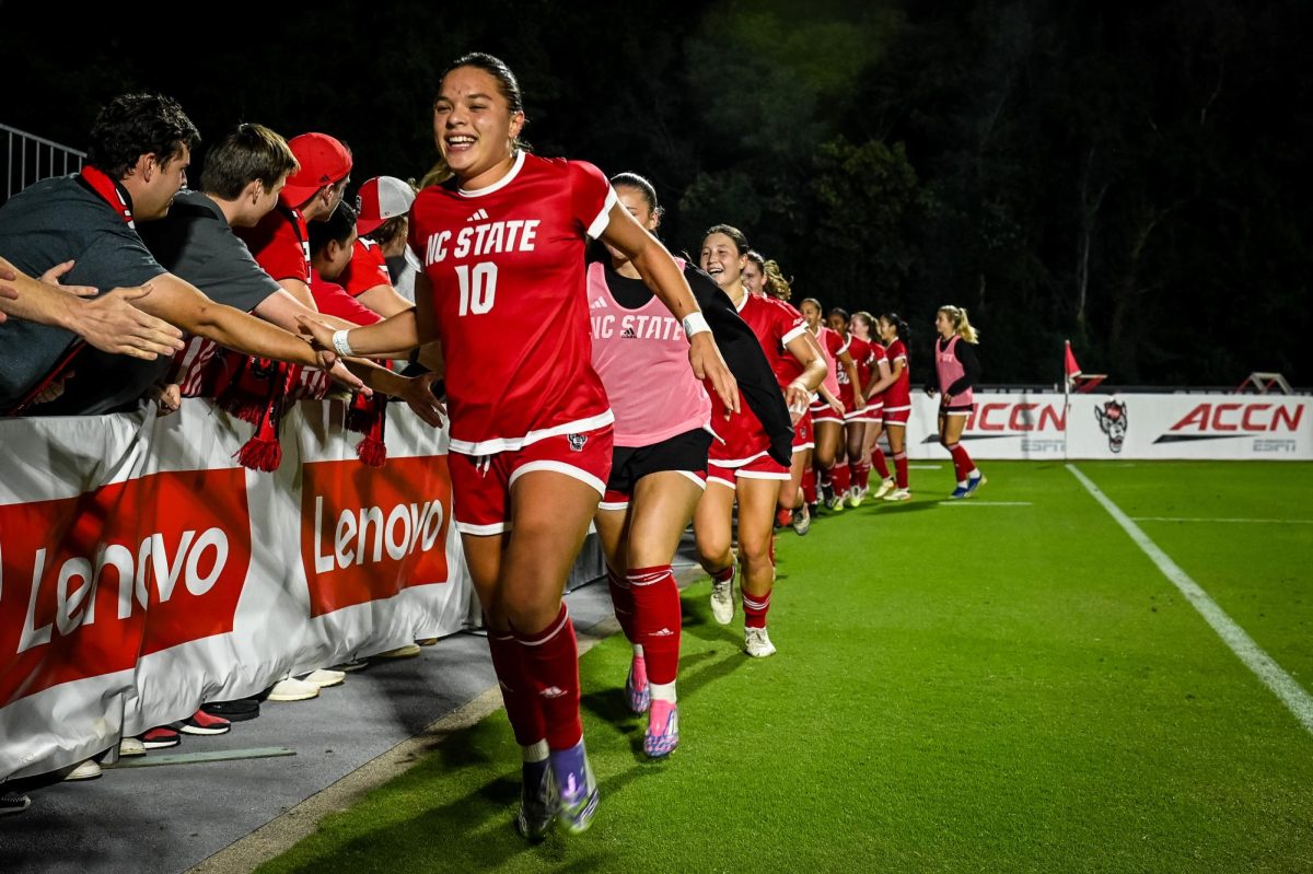 Sophomore forward Antonella Mazziotto high fives the Red Terrors after the game against Wake Forest in Dail Soccer Stadium on Thursday, Oct. 2, 2025. The Wolfpack defeated the Demon Deacons 2-1.