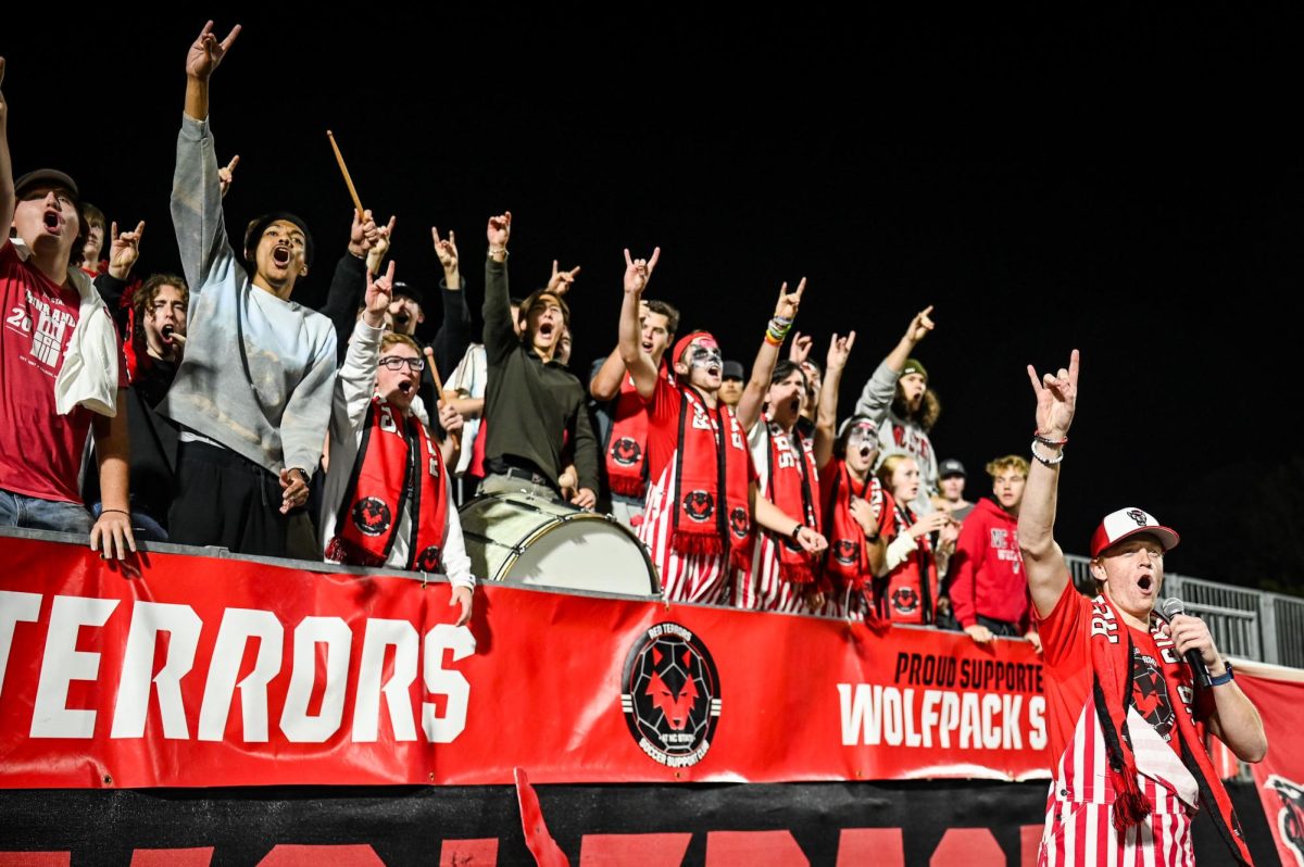 The Red Terrors throw up "Wolfies" during the game against Wake Forest in Dail Soccer Stadium on Thursday, Oct. 2, 2025. The Wolfpack defeated the Demon Deacons 2-1.