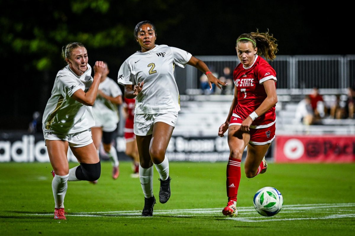 Redshirt junior forward Erica Roberts chases after the ball during the game against Wake Forest in Dail Soccer Stadium on Thursday, Oct. 2, 2025. The Wolfpack defeated the Demon Deacons 2-1.
