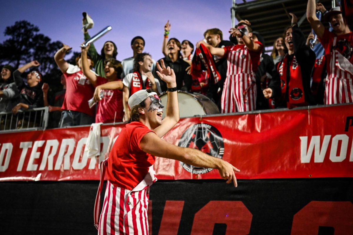 Andrew Smith, a first-year in industrial engineering, pumps up the Red Terrors after a goal during the game against Wake Forest in Dail Soccer Stadium on Thursday, Oct. 2, 2025. The Wolfpack defeated the Demon Deacons 2-1.