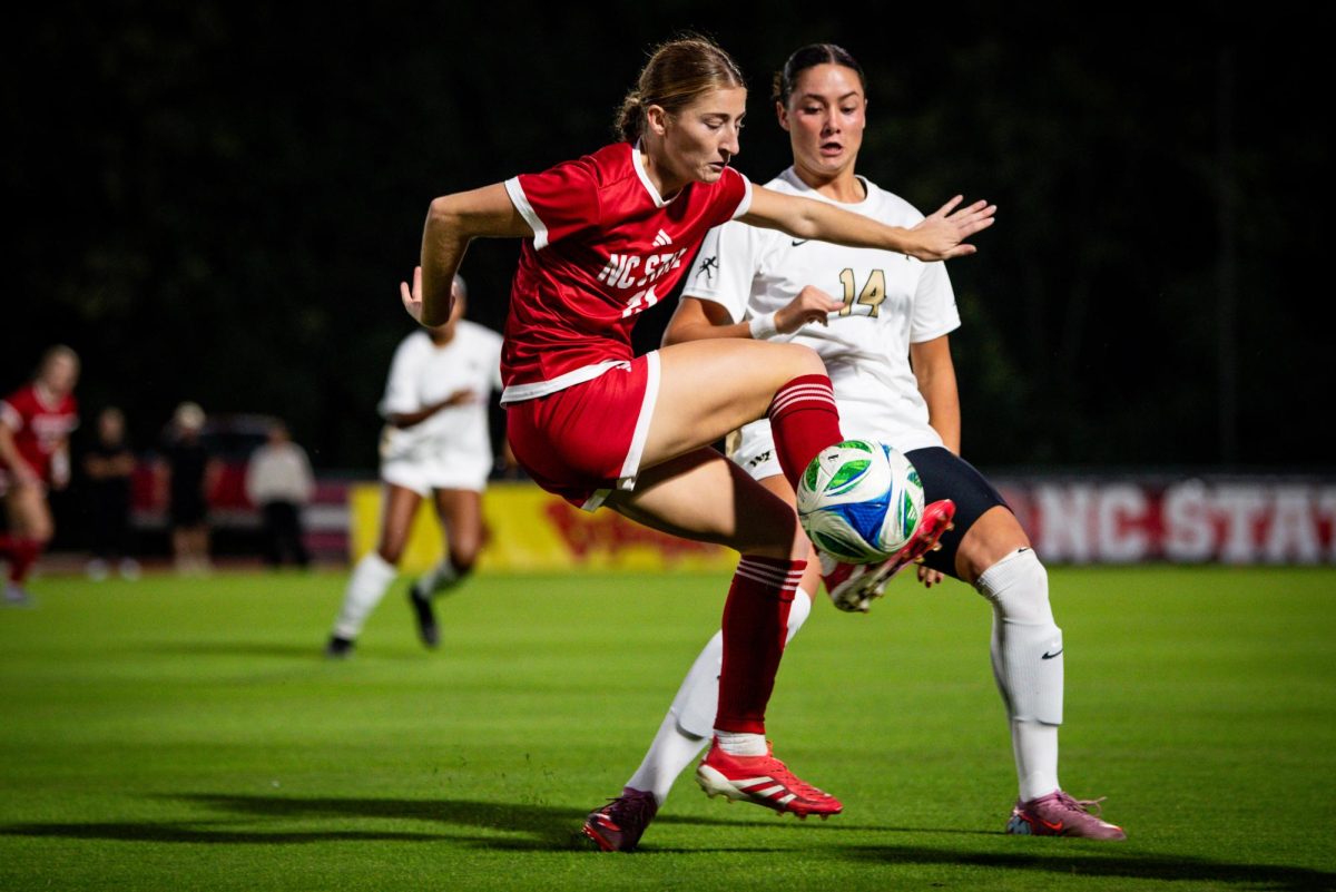 Junior midfielder Mary Frances Symmes dribbles the ball during the game against Wake Forest in Dail Soccer Stadium on Thursday, Oct. 2, 2025. The Wolfpack defeated the Demon Deacons 2-1.