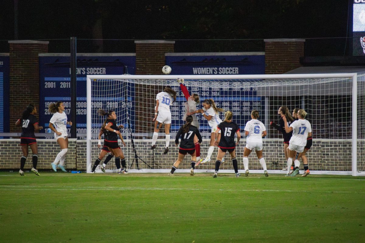 Senior goalie Olivia Pratapas jumps to save the ball during the game against UNC in Dorrance Field on Thursday, Oct. 30, 2025. Pratapas had 3 saves. NC State lost to UNC 1-0.