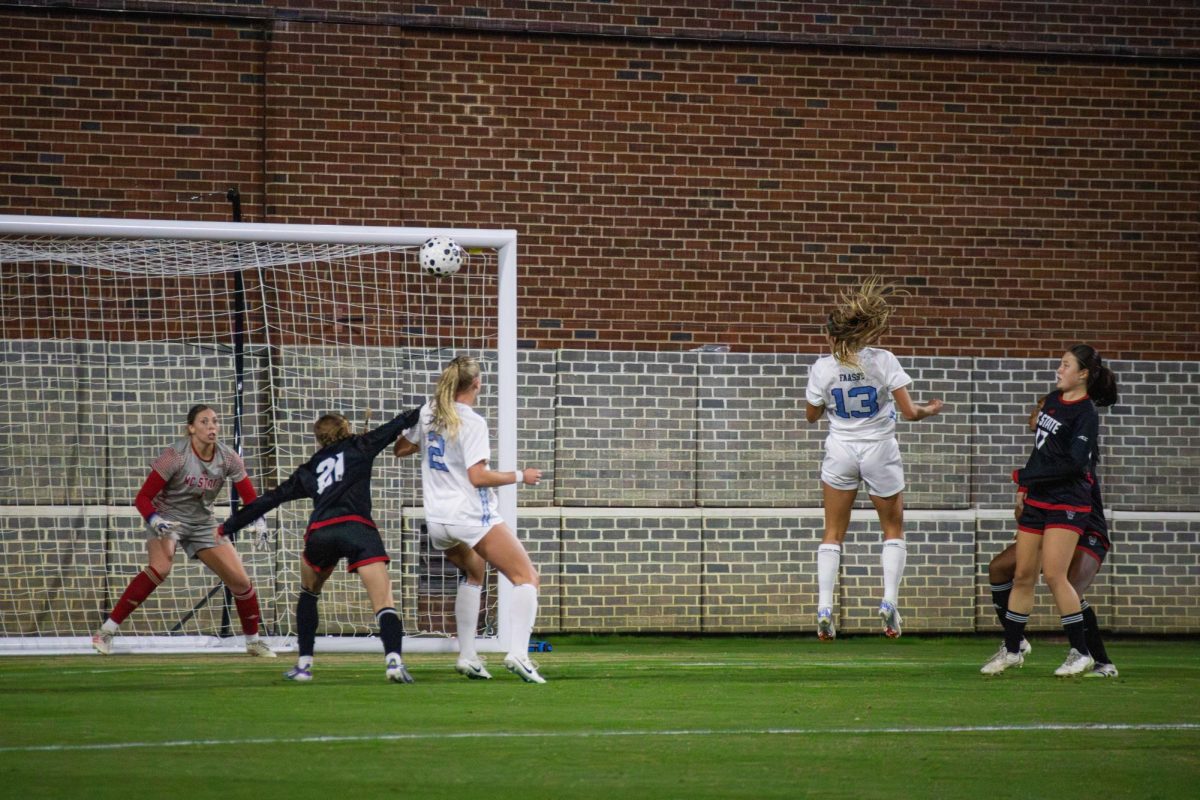Senior goalie Olivia Pratapas watches as the opponent hits the ball during the game against UNC in Dorrance Field on Thursday, Oct. 30, 2025. Pratapas had 3 saves. NC State lost to UNC 1-0.