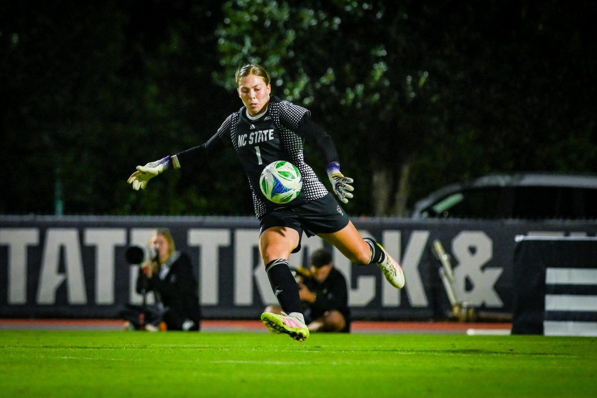 Senior goal keeper Olivia Pratapas punts the ball during the game against Wake Forest in Dail Soccer Stadium on Thursday. Oct. 2, 2025. The Wolfpack beat the Demon Deacons 2-1. 