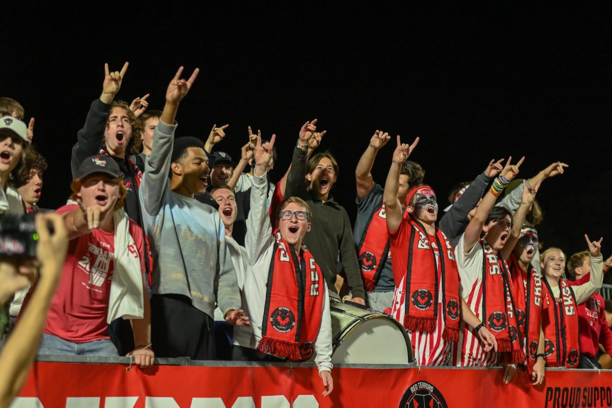 The Red Terrors throw up the "wolfies" during the game against Wake Forest in Dail Soccer Stadium on Thursday. Oct. 2, 2025. The Wolfpack beat the Demon Deacons 2-1. 