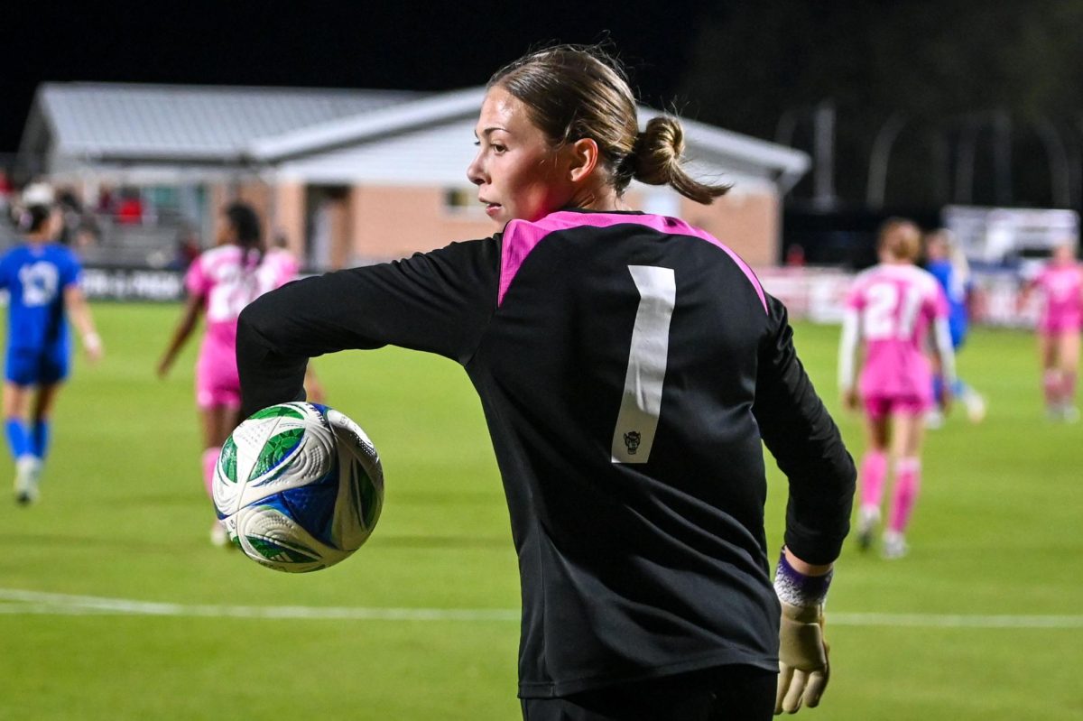 Senior goalkeeper Olivia Pratapas palms the ball in preparation for a goal kick during the game at Dail Soccer Field on Sunday, Oct. 26, 2025. Pratapas made 16 saves. The Blue Devils defeated the Wolfpack 3-1.