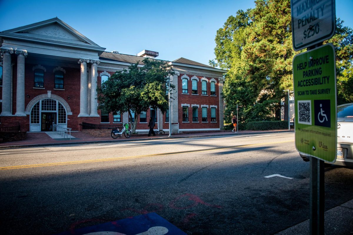 A parking accessibility sign on Hillsborough Street on Monday, Oct. 6, 2025. The City of Raleigh launched the new iAccess online survey tool on June 16, 2025.