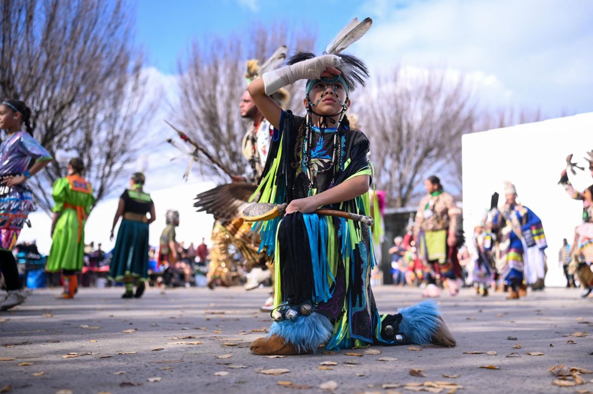 Isaiah Jacobs, a member of the Waccamaw Siouan tribe, looks out into the crowd while dancing in his regalia during the 30th Annual American Indian Heritage Celebration at the North Carolina Museum of Art on Saturday, Nov. 22, 2025. Jacobs' mother remarked that Indigenous dance was his passion.
